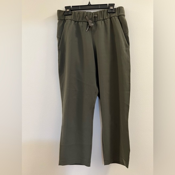 W2. Lululemon Pants On the Fly Crop *Woven 23" Dark Olive - Picture 2 of 14
